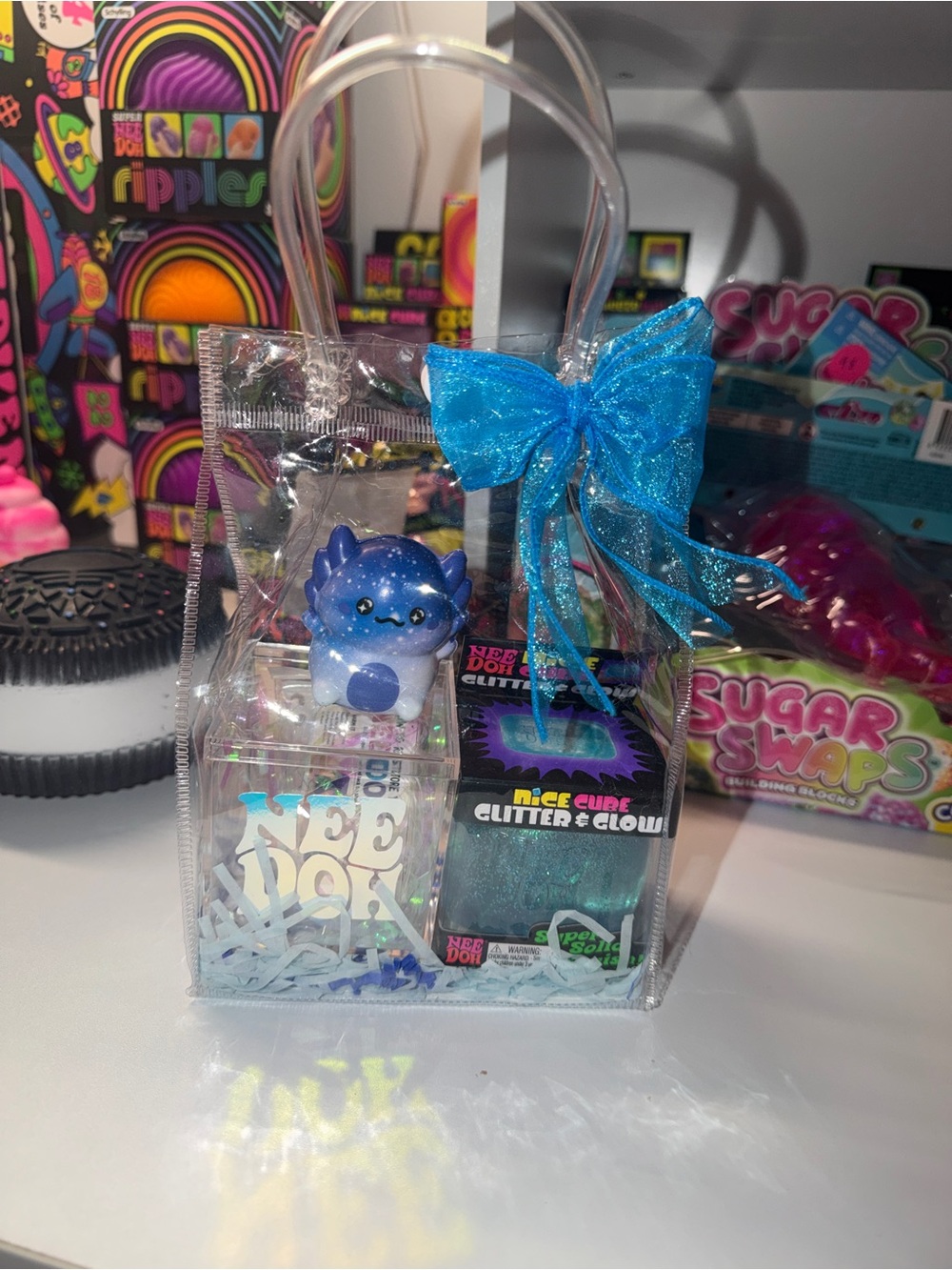 Clear Gift Bag with Blue Glitter & Glow Needoh case & Cute Blue axolotlo